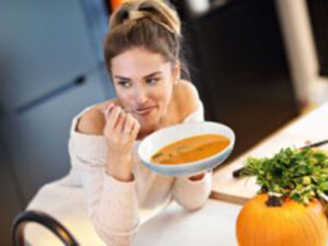 Woman having soup