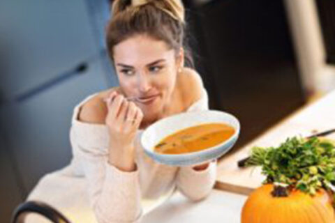 Woman having soup